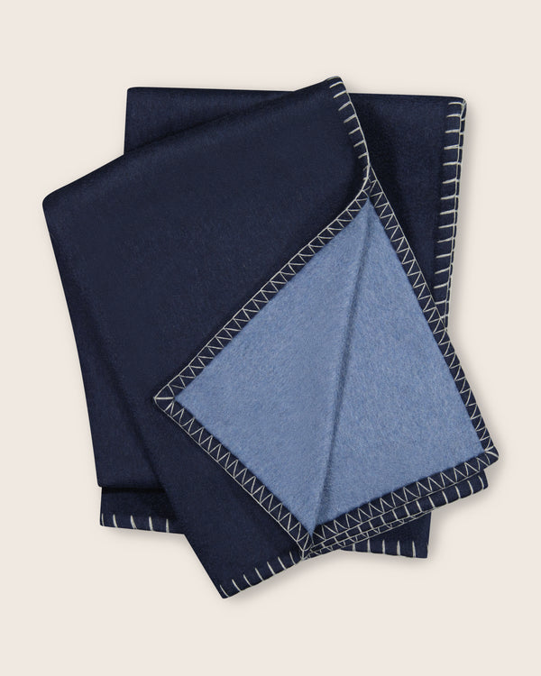 Gotham Whipstitch Dual-Colored Cashmere Throw in navy-denim