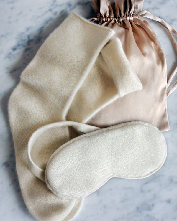 Capri Cashmere Travel Set in ivory; flat images of socks, eye sleep mask and silk pouch