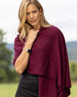 Model wearing Radiant Cashmere Sequin Wrap in burgundy