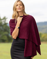 Model wearing Radiant Cashmere Sequin Wrap in burgundy