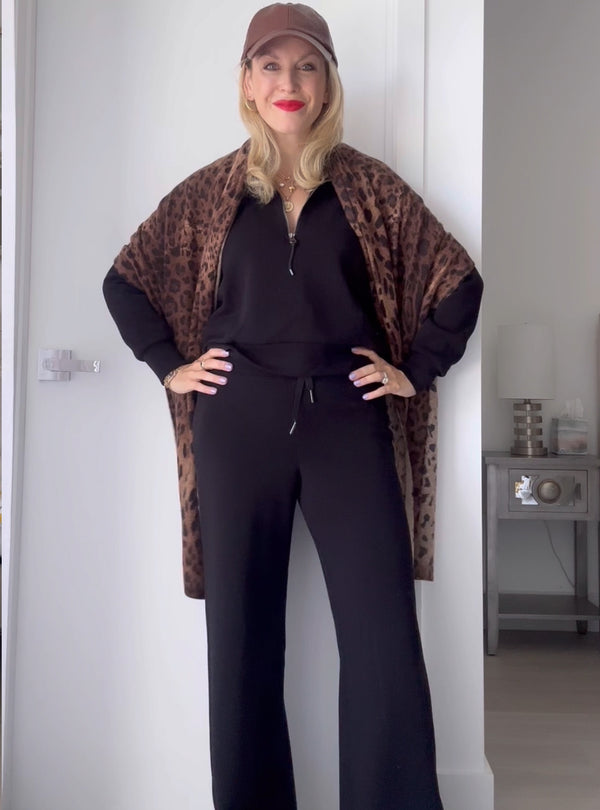 stylist sam brown wearing leopard print cashmere wrap in camel leopard