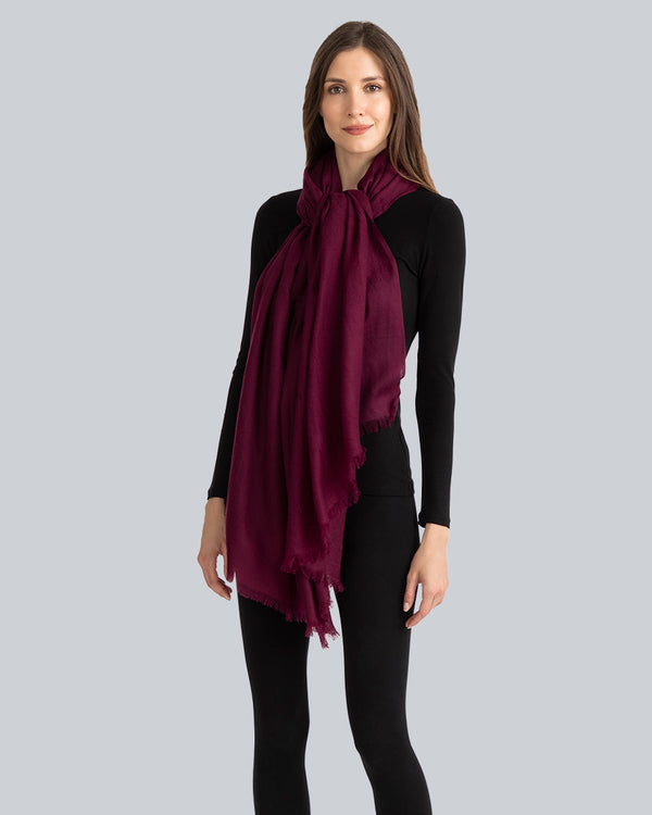 Woman wearing Lightweight Cashmere Wrap in  Bordeaux