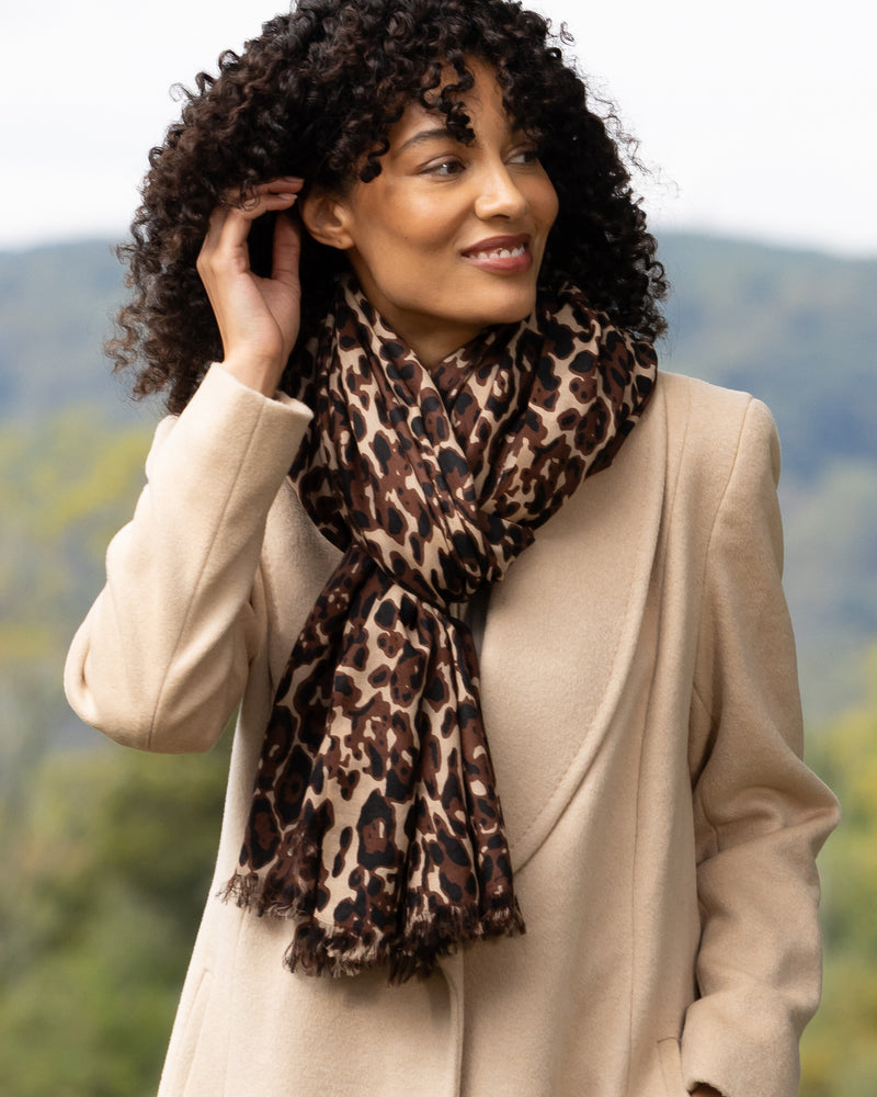 close up of Woman wearing Lightweight cashmere wrap in  camel leopard