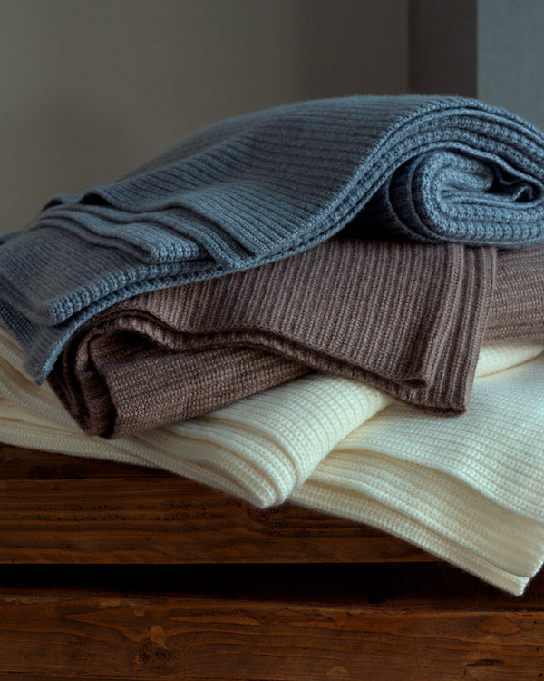 stack of cashmere Shaker throw in ivory